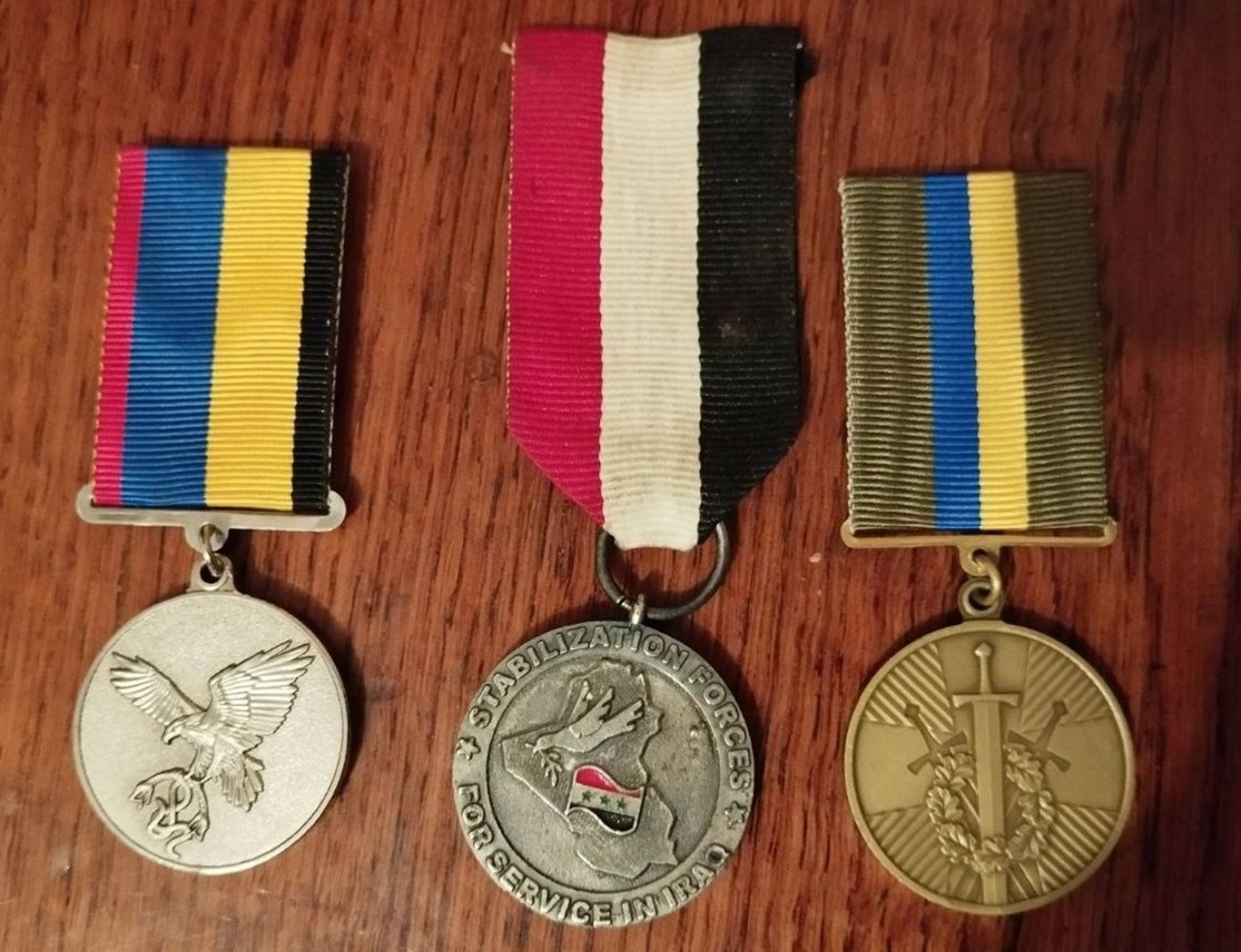 Нагороди Володимира Красніка за участь у миротворчій місії в Іраку та АТО.